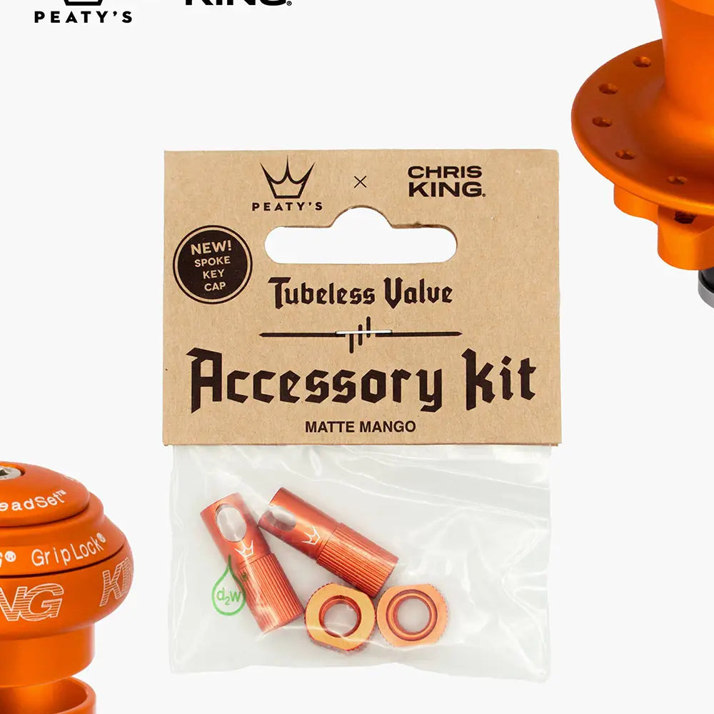 Peaty's Tubeless Valve accessory kit in matte mango