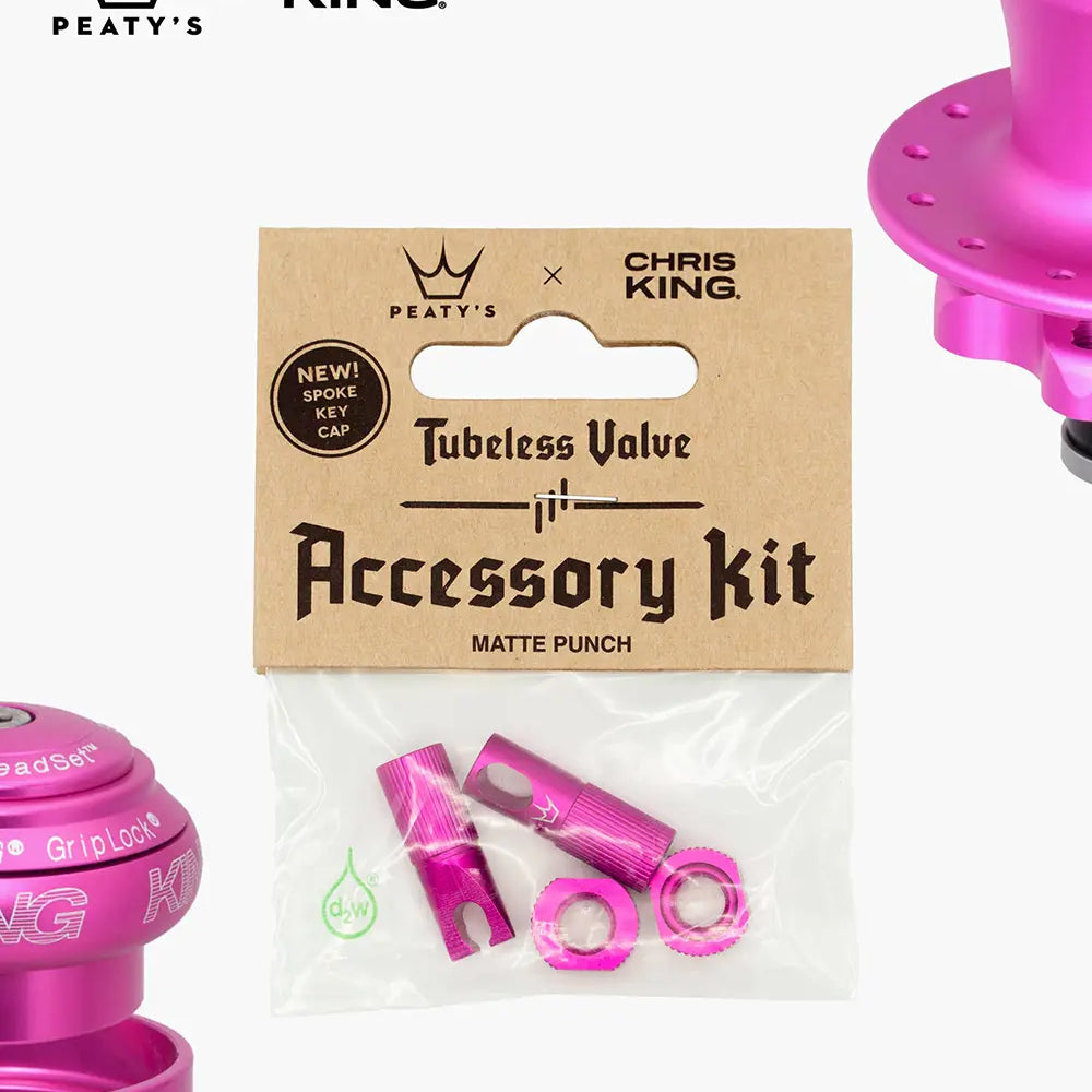 Peaty's Tubeless Valve accessory kit in matte punch