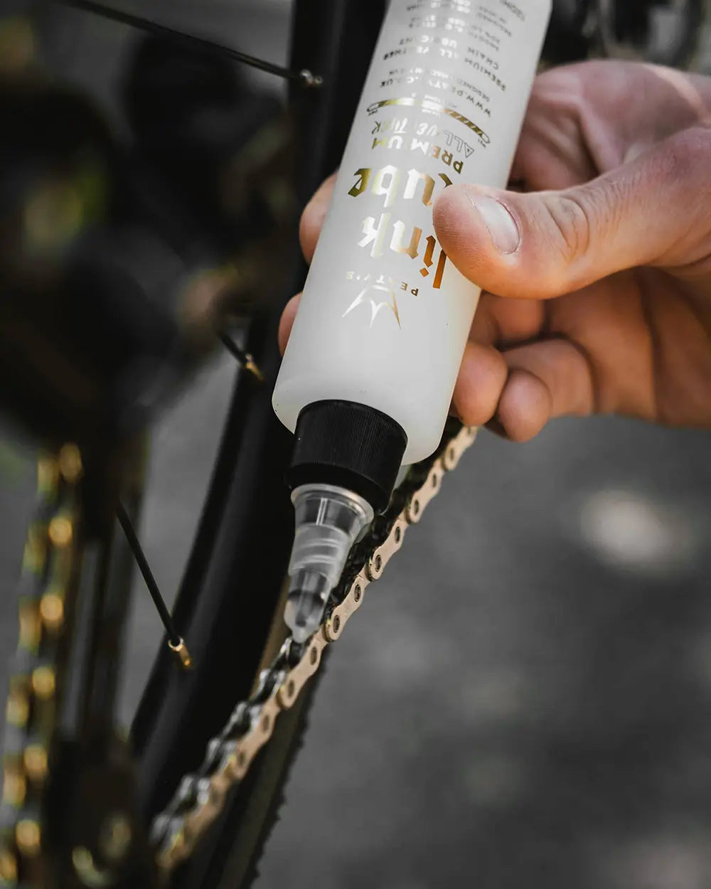 Peaty's LinkLube Premium All Weather chain lube in use