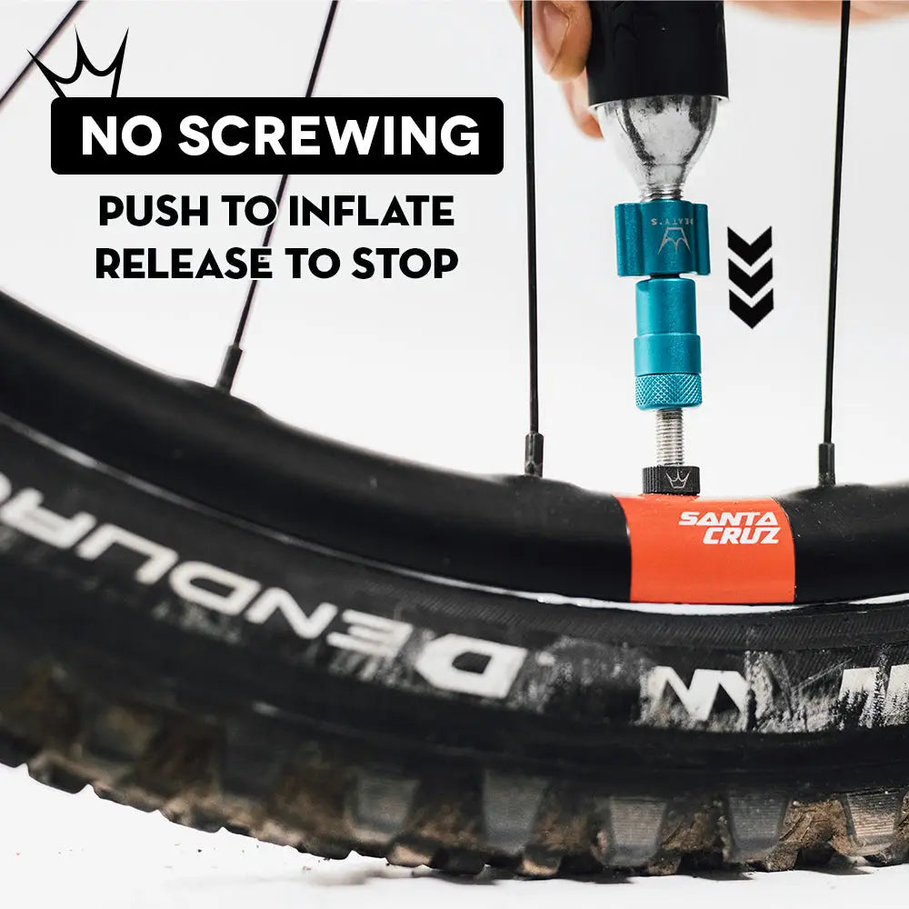 Peaty's Holeshot CO2 Inflator Kit features no screwing, push to inflate and release to stop