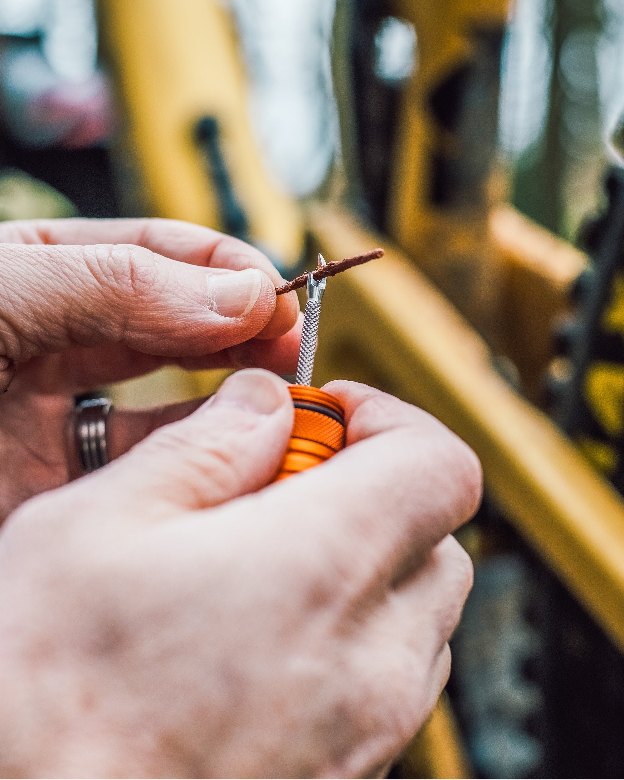 Peaty's Holeshot Puncture Plug Refill Pack - in use with the puncture plugger tool