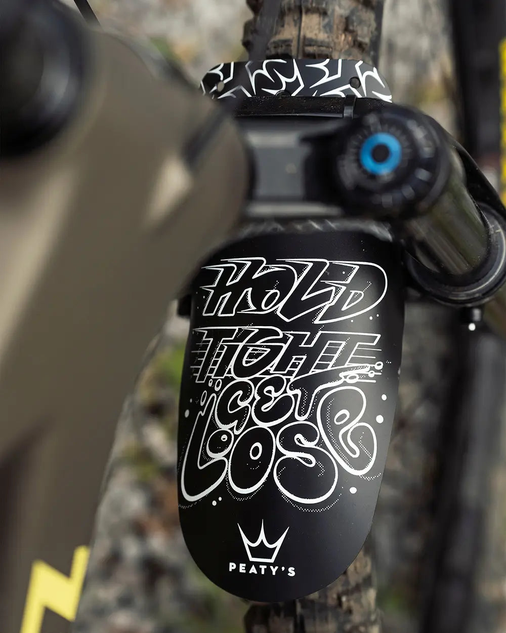 Peaty's x MarshGuard mudguard in hold tight get loose, on a bike